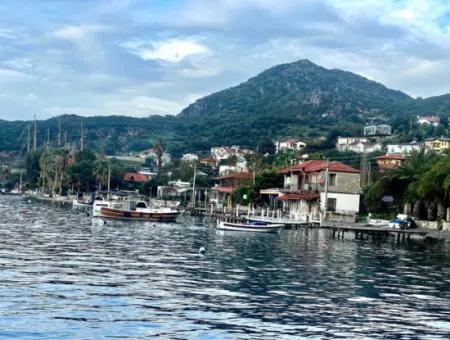 Detached House For Sale On 2000M2 Plot Of Land By The Sea In Marmaris Söğüt Neighborhood. Suitable For Tying A Boat In Front Of It.