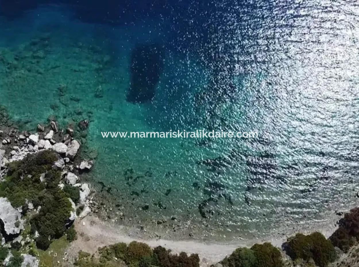 Marmaris Söğüt Köyünde 500 M2 Denize 20 Metre Muhteşem Deniz Manzaralı Satılık Tarla