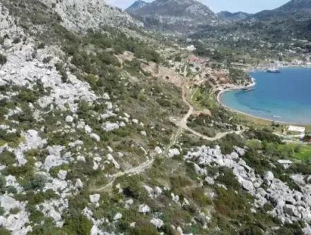 Marmaris İlçesi Söğüt Köyünde Denize 50 Metre Yatırım İçin Uygun 2000M2 Satılık Deniz Manzaralı Arsa